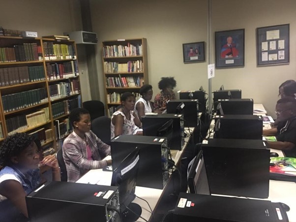 Group seated at computers